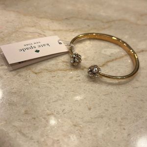Woman’s Kate spade New York bracelet.